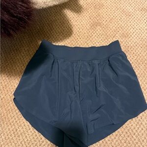 Feathery-Fit Soft Mid Rise Dolphin Lined Shorts 4''